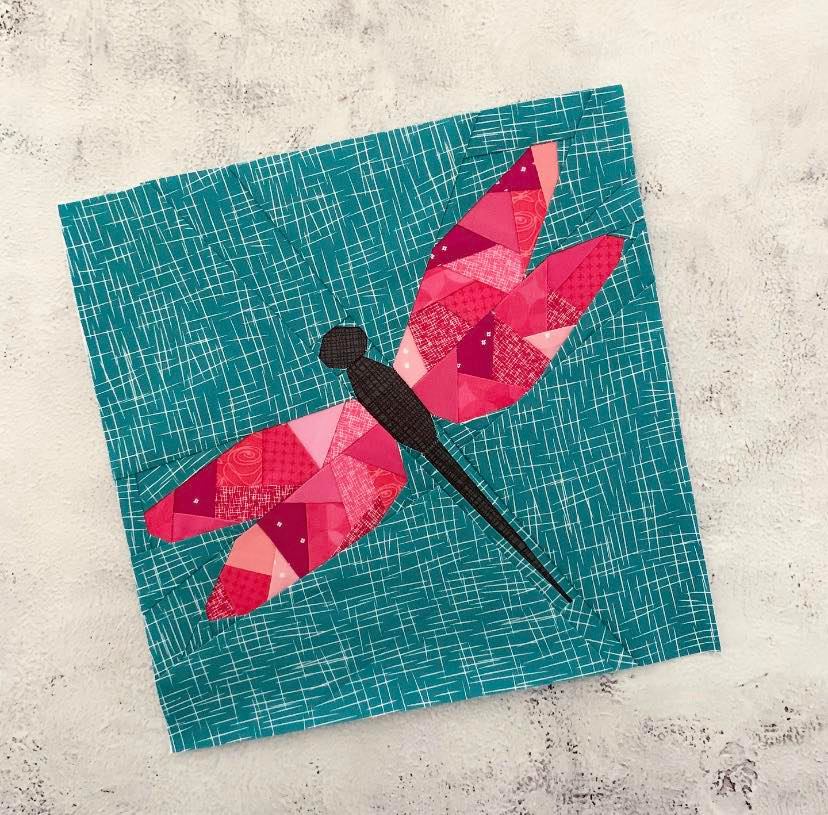 dragonfly with geometric wings in pink sewn in fabric