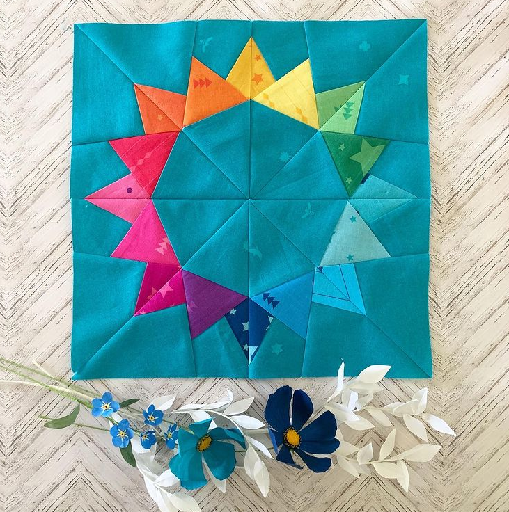 flicker paper pieced pattern sewn in rainbow fabrics