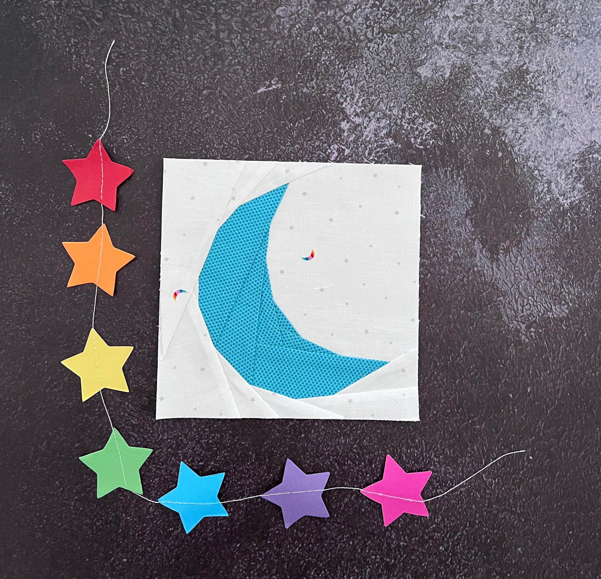 little moon paper pieced pattern sewn in fabric