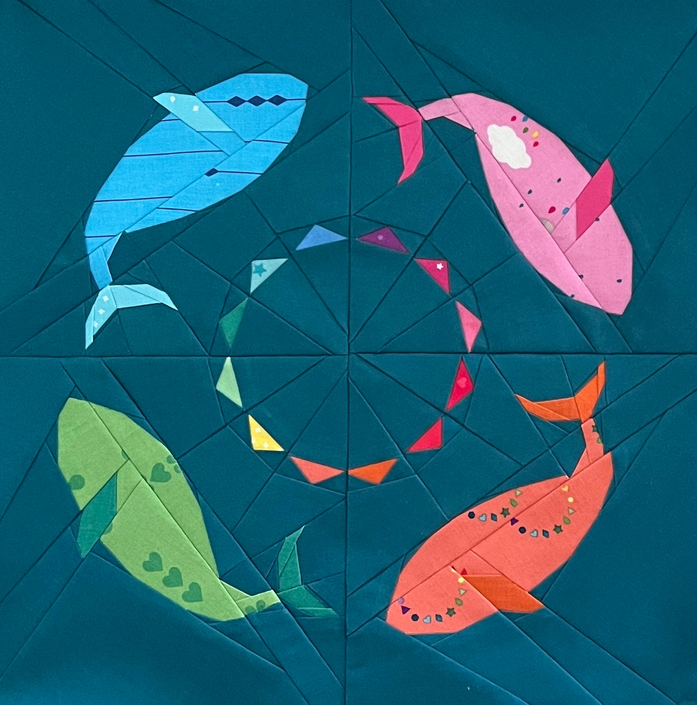 pod of whales paper pieced pattern sewn in fabric