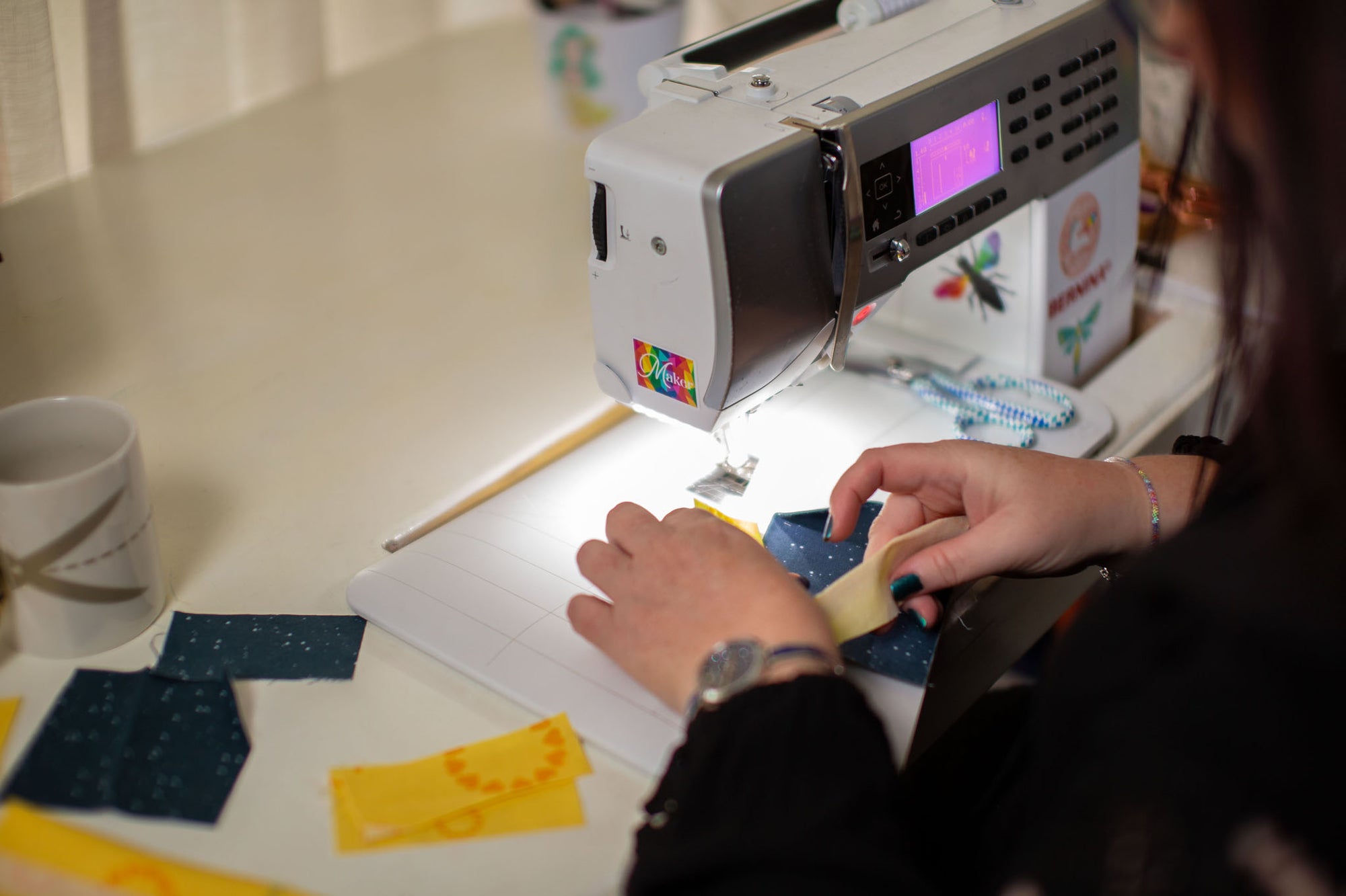 Kristy sewing a foundation paper piece