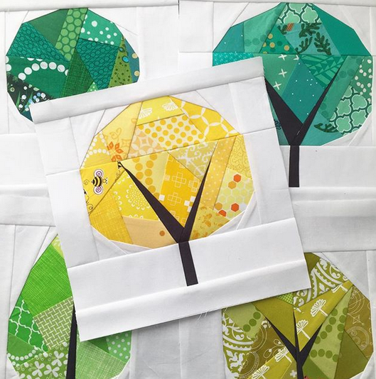 geometric trees in seasonal colours paper pieced pattern sew in fabrics with scrappy prints