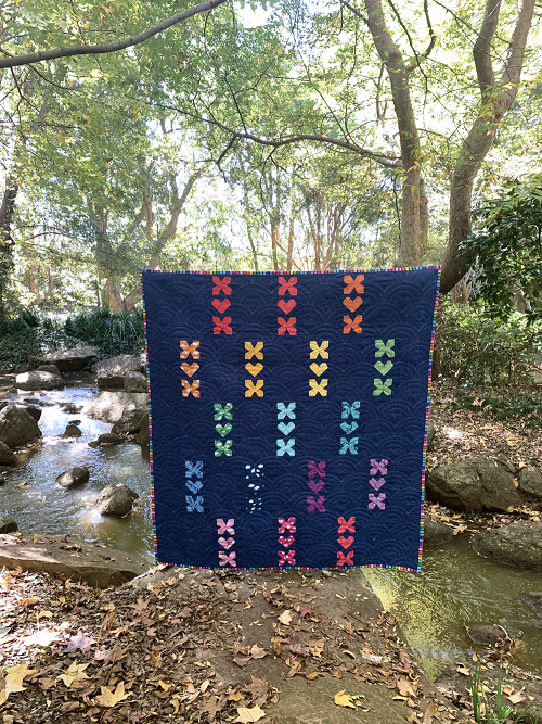 Lullaby quilt foundation paper pieced pattern featuring crosses and hearts  sewn in fabric