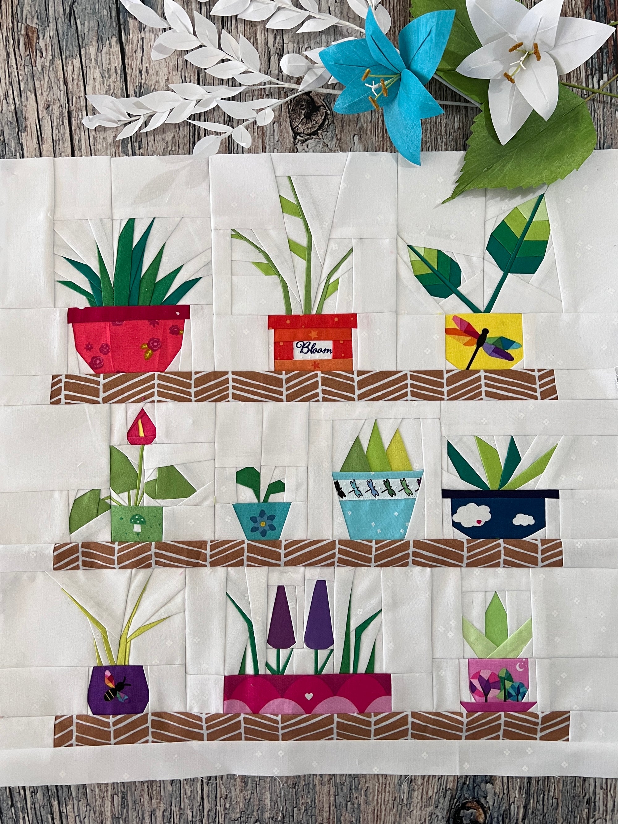 Finished Potted Plants foundation paper pieced quilt showing multiple plant blocks sewn together