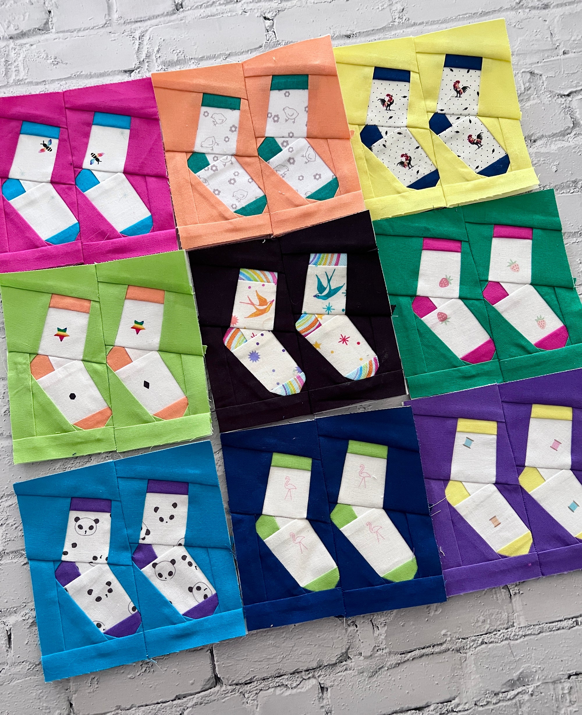Finished silly socks foundation paper pieced quilt blocks display