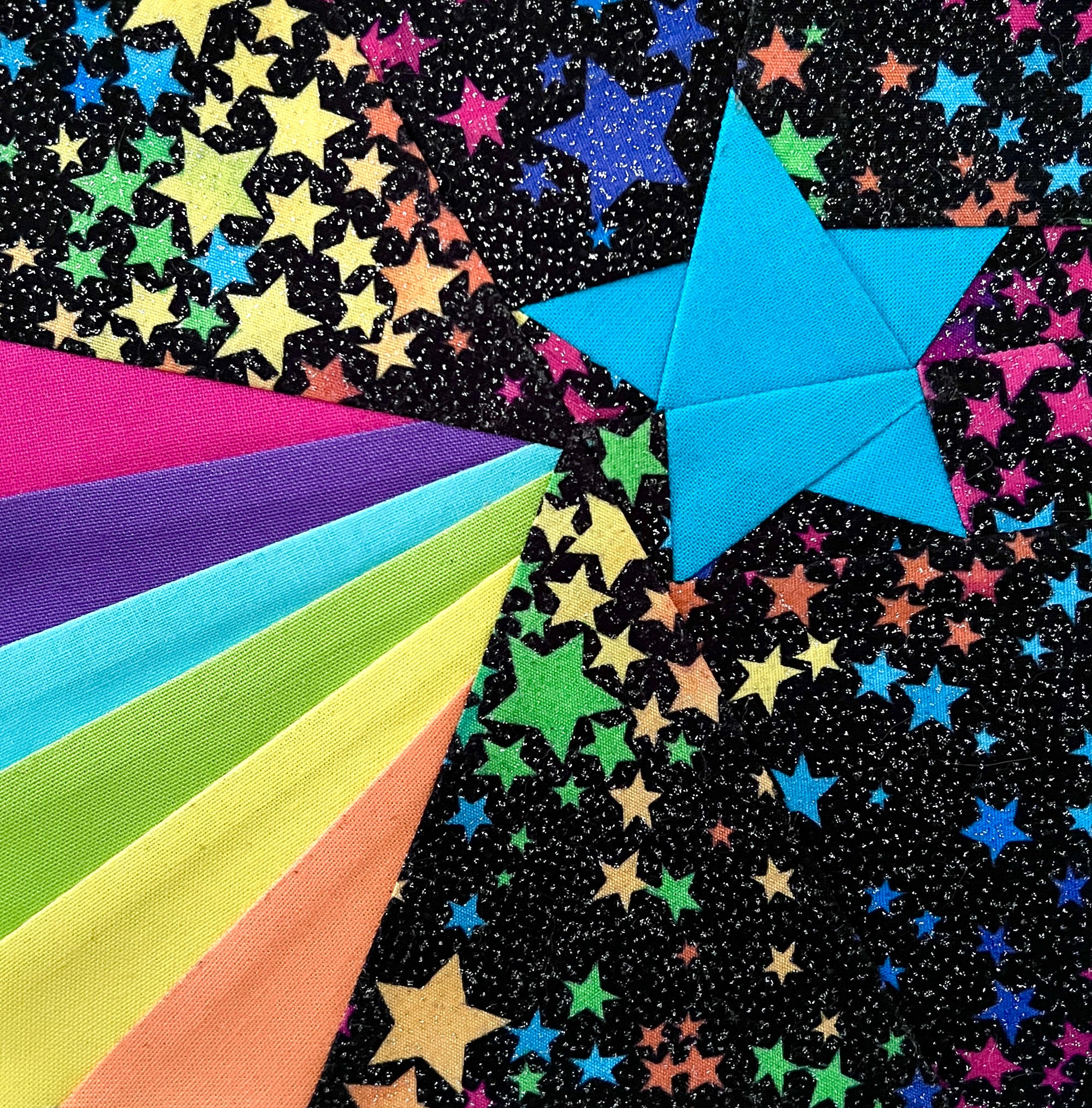 foundation-paper-piece-blue-wishing-star-rainbow-on-black-and-colorful-background